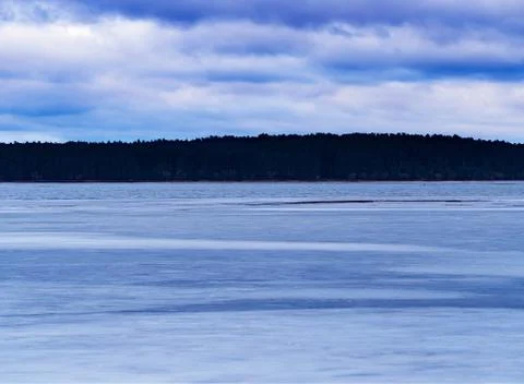 Frozen spring river landscape background Stock Photos