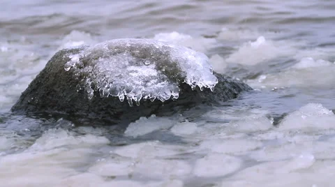 Frozen stone in winter cold sea Stock Footage 44498092