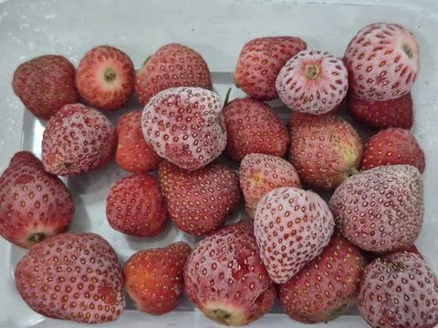 Frozen strawberries. Photos