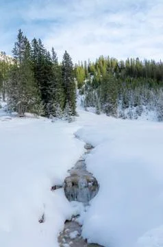 Frozen stream in austrian alps Stock Photos