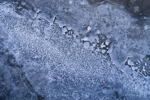 Frozen surface of the water surface with structures Stock Photos