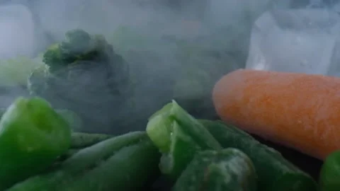 Frozen vegetables camera slide,cauliflower,carrots,peas,string beans,Concept of Stock Footage 131606240