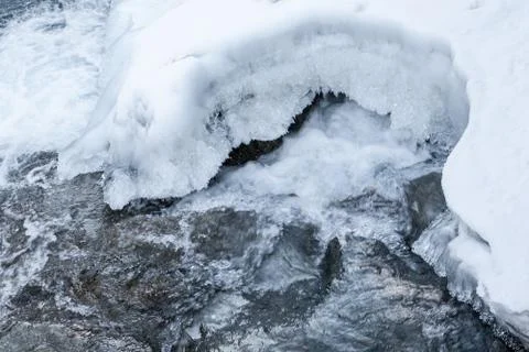 Frozen water; ice on the river Stock Photos