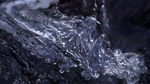 Frozen water by the stream Video stock 168686097