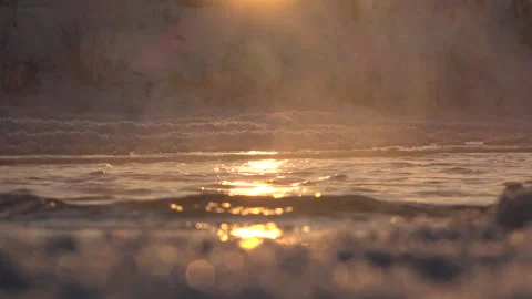 Frozen water surface holds ice sheets and cracks - Glassy Ice and Cold Surface Stock Footage 339818110