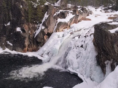 Frozen waterfall Stock Footage 73953304