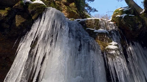 Frozen waterfall in forest Stock Footage 87143661