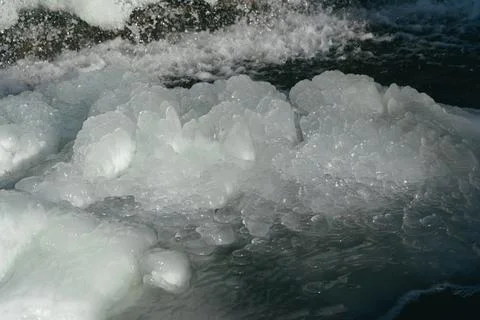Frozen waterfall. Huge chunks of ice. Blocks of ice in the waterfall Stock Photos