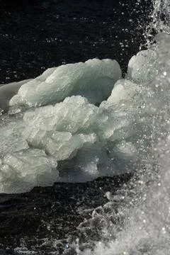 Frozen waterfall. Huge chunks of ice. Blocks of ice in the waterfall Stock Photos