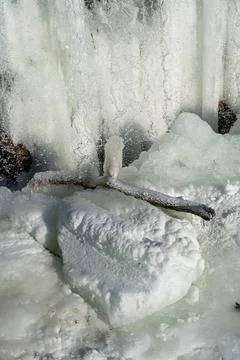 Frozen waterfall. Huge chunks of ice. Blocks of ice in the waterfall Stock Photos