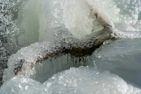 Frozen waterfall. Huge chunks of ice. Blocks of ice in the waterfall Stock Photos