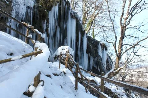 A frozen waterfall with icicles Foto stock