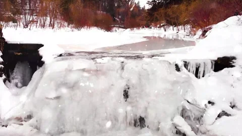 Frozen Waterfall in Winter Forest Under Heavy Snowfall 스톡 동영상 330278921
