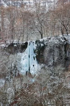 Frozen waterfall in winter time Stock Photos