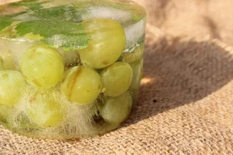 Frozen white grapes Stock Photos