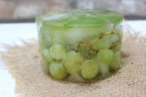 Frozen white grapes Stock Photos