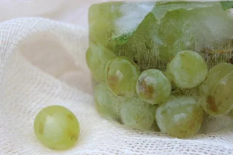 Frozen white grapes Stock Photos