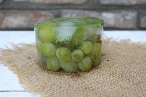 Frozen white grapes Stock Photos