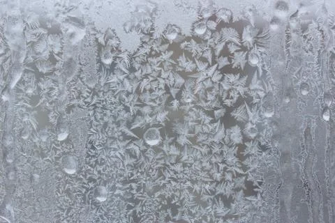 A frozen window with an interesting and varied design Stock Photos