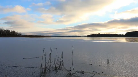 Frozen winter lake at sunset. Stock Footage 60216591