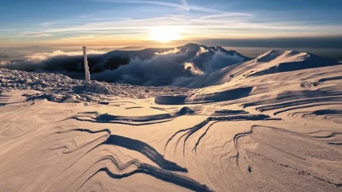 Frozen winter mountains background with beautiful structure of snow at sunrise Stock Footage 228488057