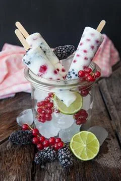 Frozen yogurt popsicles Stock Photos