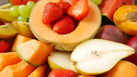 Fruit and berries in a plate. Stock Footage 302920382