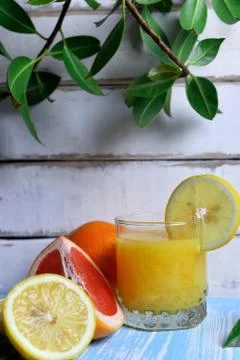 Fruit and juice on the table Stock Photos