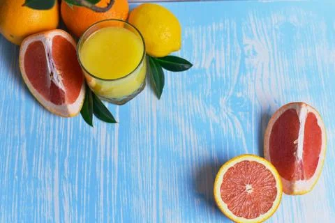 Fruit and juice on the table Stock Photos