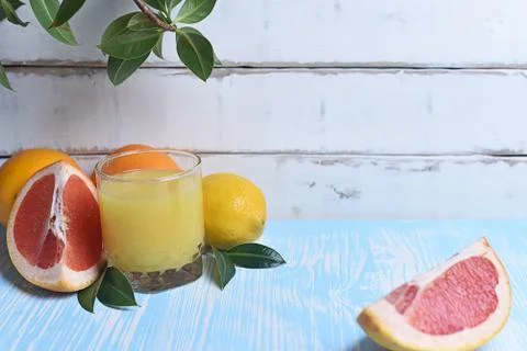 Fruit and juice on the table Stock Photos