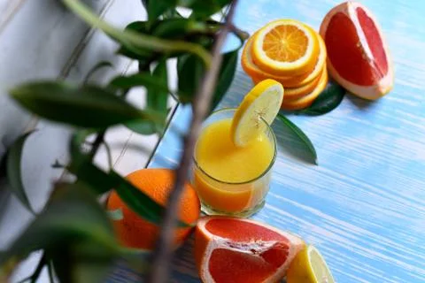 Fruit and juice on the table Stock Photos