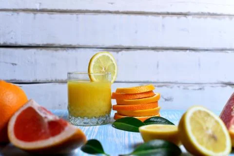 Fruit and juice on the table Stock Photos