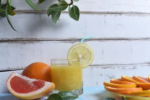 Fruit and juice on the table Stock Photos