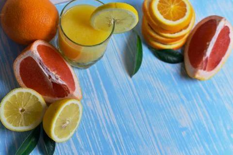 Fruit and juice on the table Stock Photos