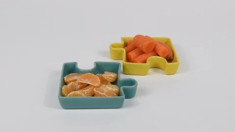 Fruit and vegetable puzzle animation on a white background Video stock 125508628
