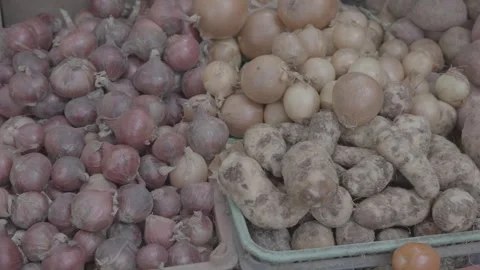 A fruit and vegetable stand on the side of the road in Manila, Philippines Stock Footage 345844656