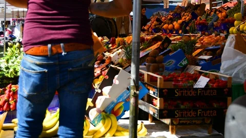 Fruit and vegetable stand at the weekly market Stock Footage 105397485