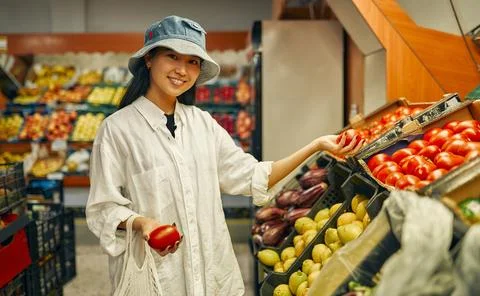At the fruit and vegetable store Stock Photos