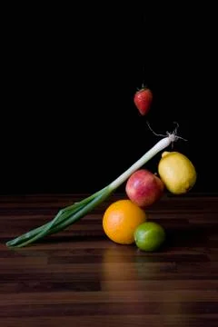 Fruit and vegetables floating mid-air Stock Photos
