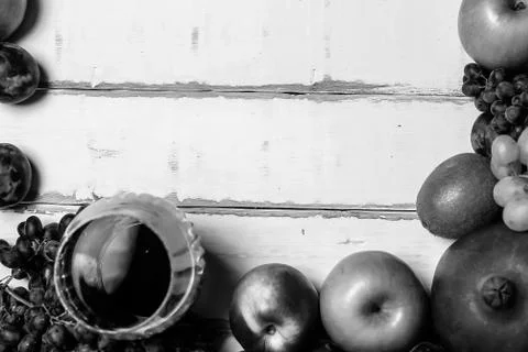 Fruit and wine on the table Stock Photos