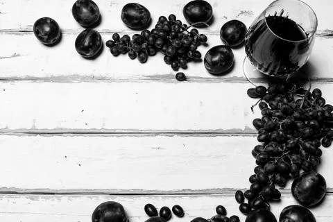 Fruit and wine on the table Stock Photos