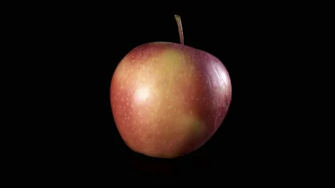 Fruit  apple Spinning and Rotating Isolated on black Background Stock Footage 223227882