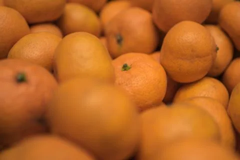 Fruit background. Small ripe orange tangerines. Vitamin complex Stock Photos