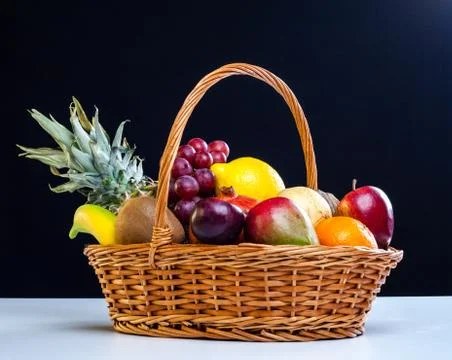 Fruit basket Stock Photos