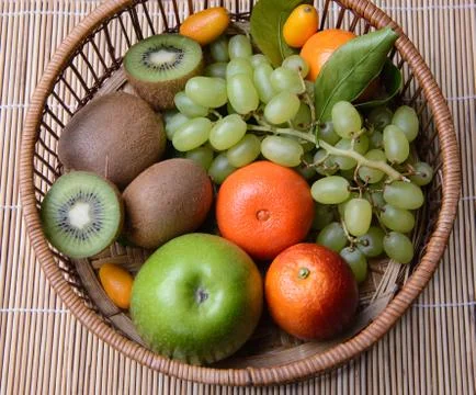 Fruit basket Stock Photos
