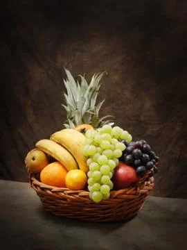 Fruit basket Stock Photos