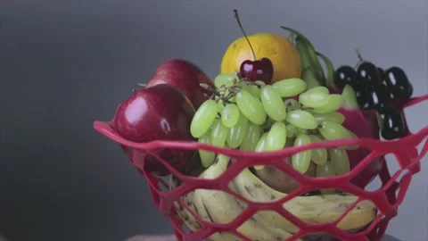 Fruit basket rotating on table.  background stock footage. Stock Footage 155110121