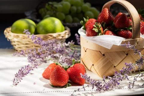 Fruit in Baskets on a Table Stock Photos