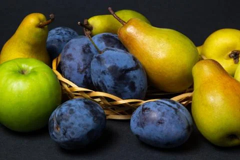 Fruit on a black background. Stock Photos