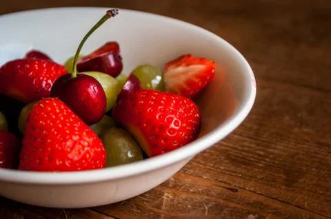 Fruit in a Bowl on Table Close-up Stock Photos